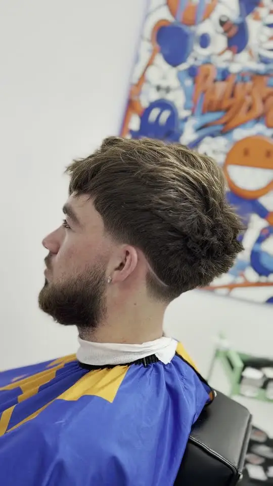 Une coupe faite au studio : Coupe et barbe Studio.